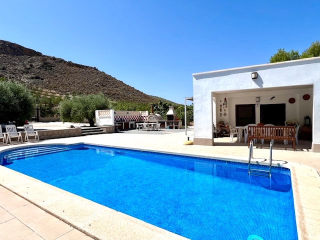 Swimming pool and poolside building