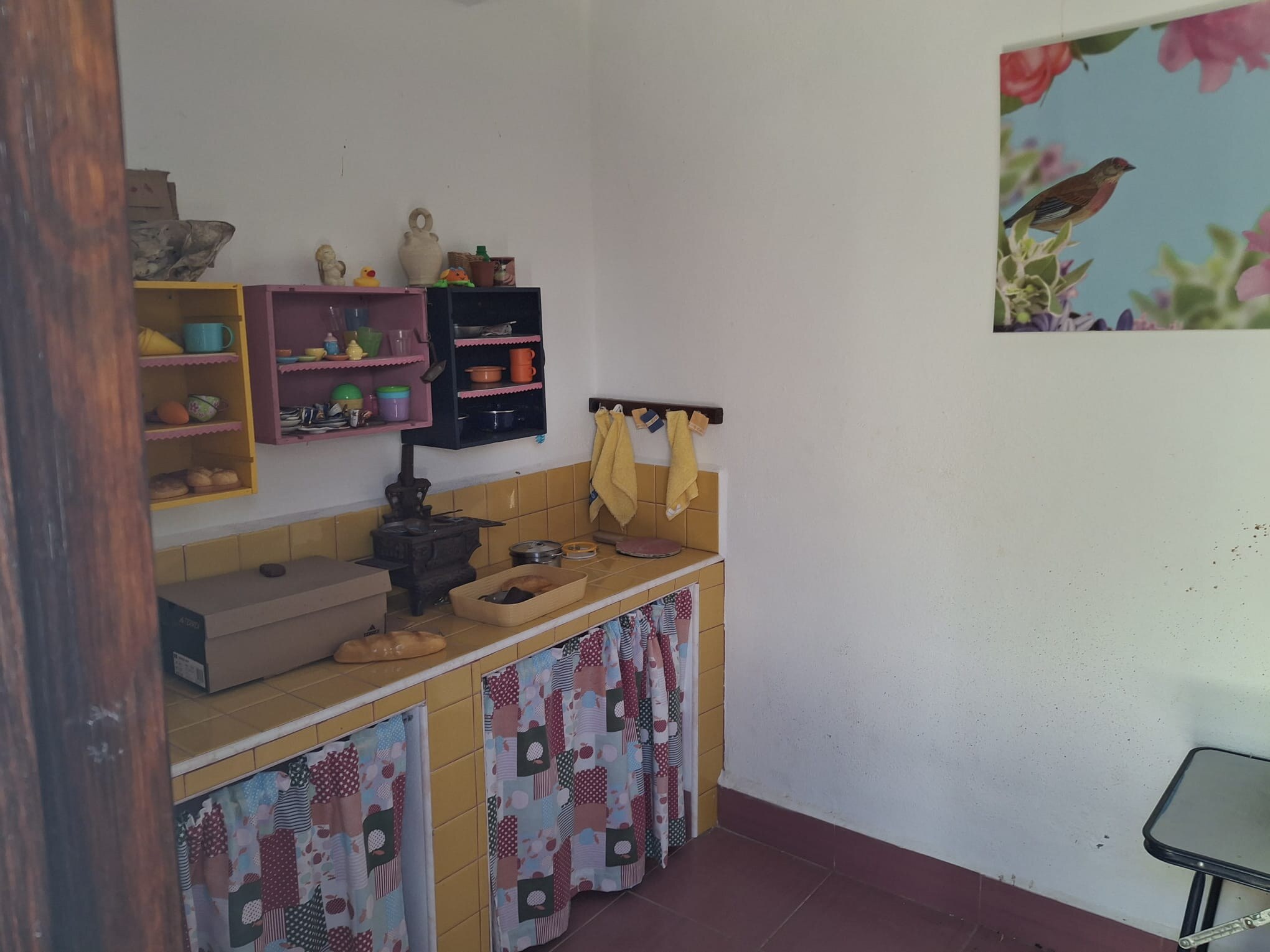 Miniature play kitchen inside La Casita de Daniela